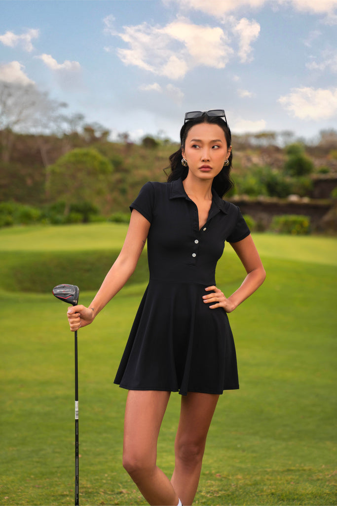 All-day black Linn Sports Dress with matching shorts with functional pockets. A blend of performance and elegance 