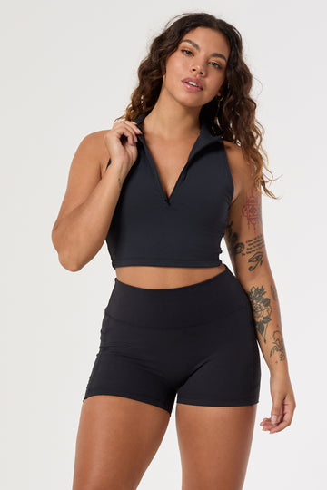 Cute black shorts: mid-high waisted with side pockets, V-shaped back seam, squat proof, no front seam, and double-layered waistband.