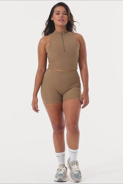 Cute light brown shorts: mid-high waisted with side pockets, V-shaped back seam, squat proof, no front seam, and double-layered waistband.