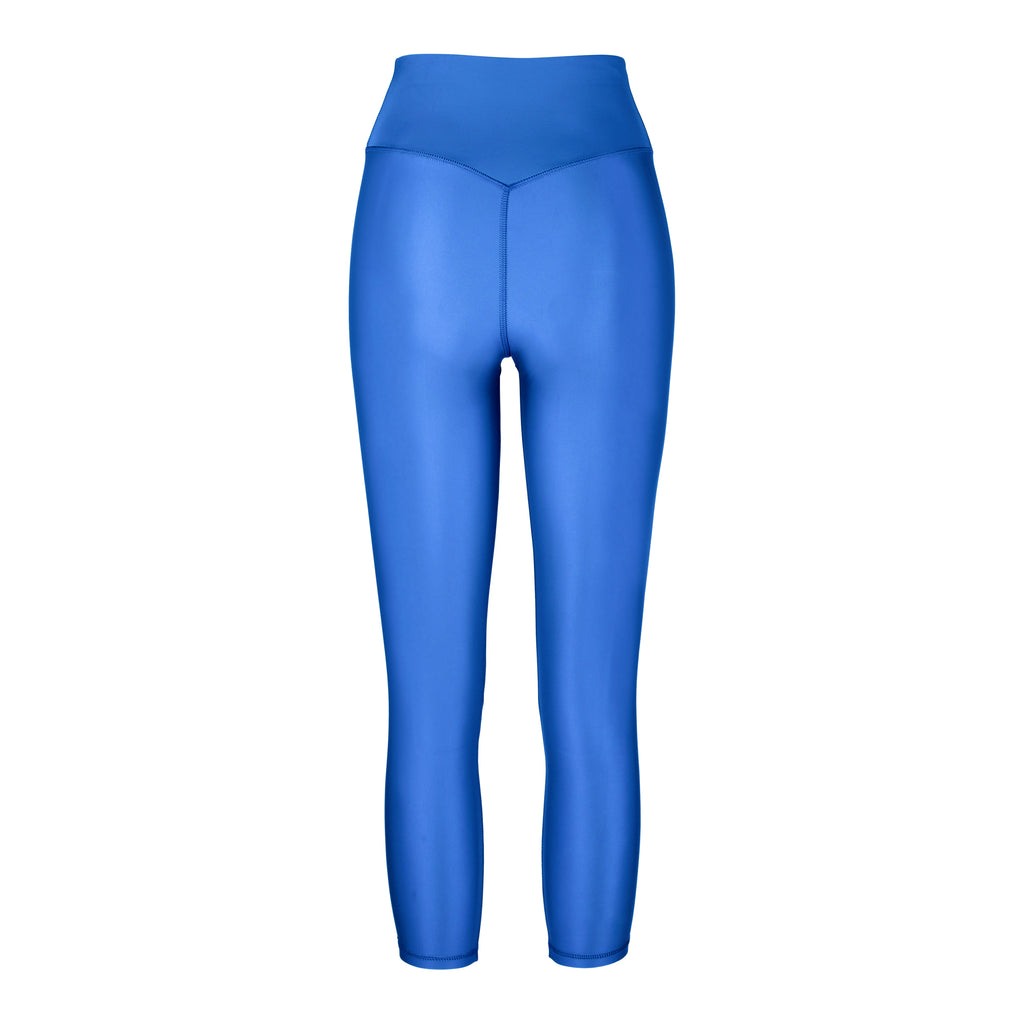 Versatile clear blue 7/8 compressive leggings that fit like a glove and stay put during workouts. Squat proof and no front seam for ultimate comfort, ghost image back view