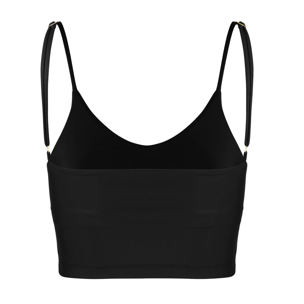 Black crop top with inbuilt bra for low-impact activities, seamless fit, removable padding, and adjustable straps. Comfortable for work or on the go, ghost image back view