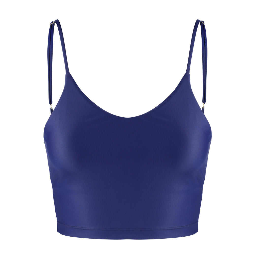 Navy blue crop top with inbuilt bra for low-impact activities, seamless fit, removable padding, and adjustable straps. Comfortable for work or on the go, ghost image close up