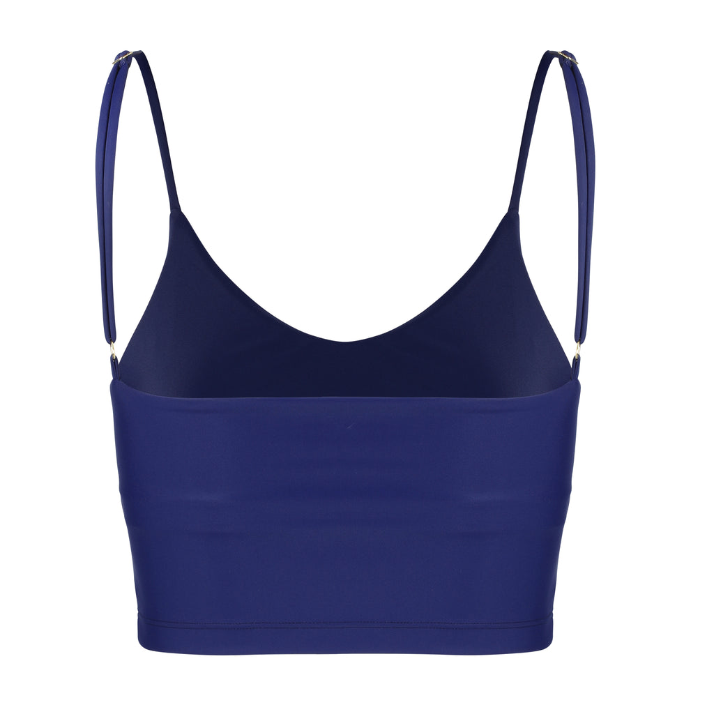 Navy blue crop top with inbuilt bra for low-impact activities, seamless fit, removable padding, and adjustable straps. Comfortable for work or on the go, ghost image back view