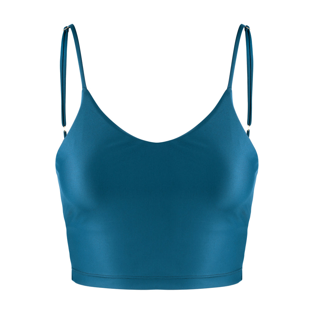 Mid blue crop top with inbuilt bra for low-impact activities, seamless fit, removable padding, and adjustable straps. Comfortable for work or on the go, ghost image front view