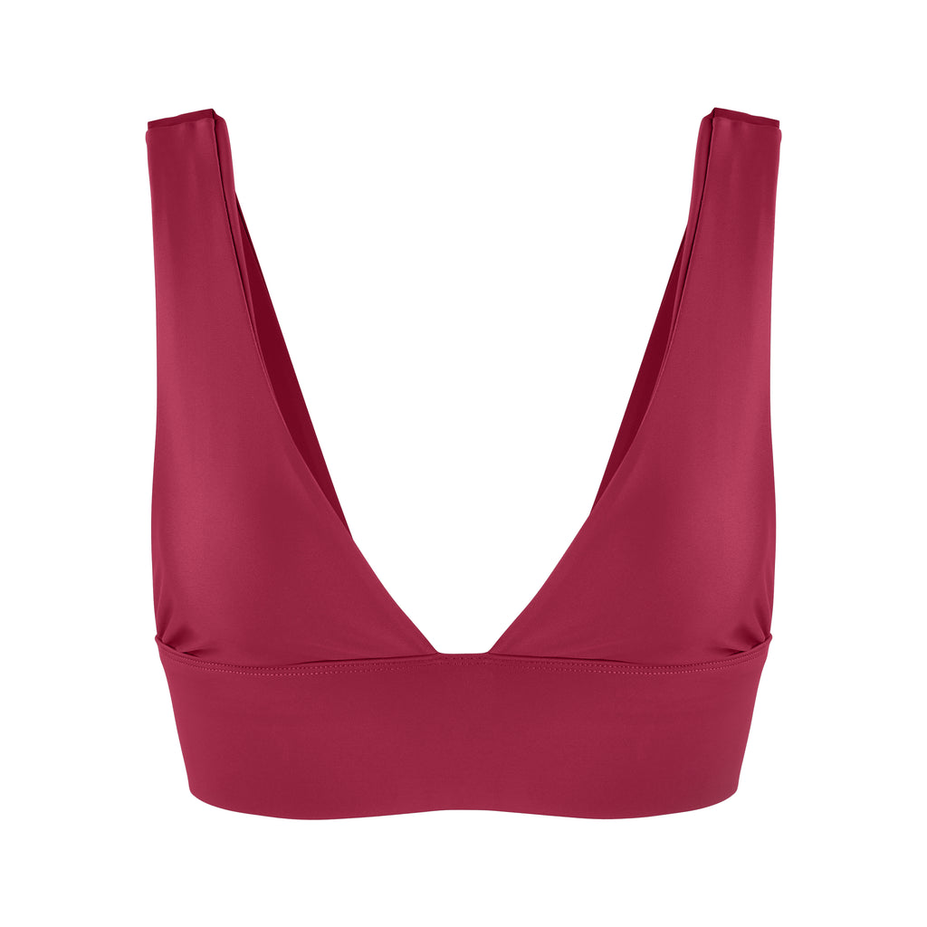 Classy and sexy sports bra in dark red with low-impact support, seamless fit, removable padding, and a wide under-bust elastic band ghost image  front view