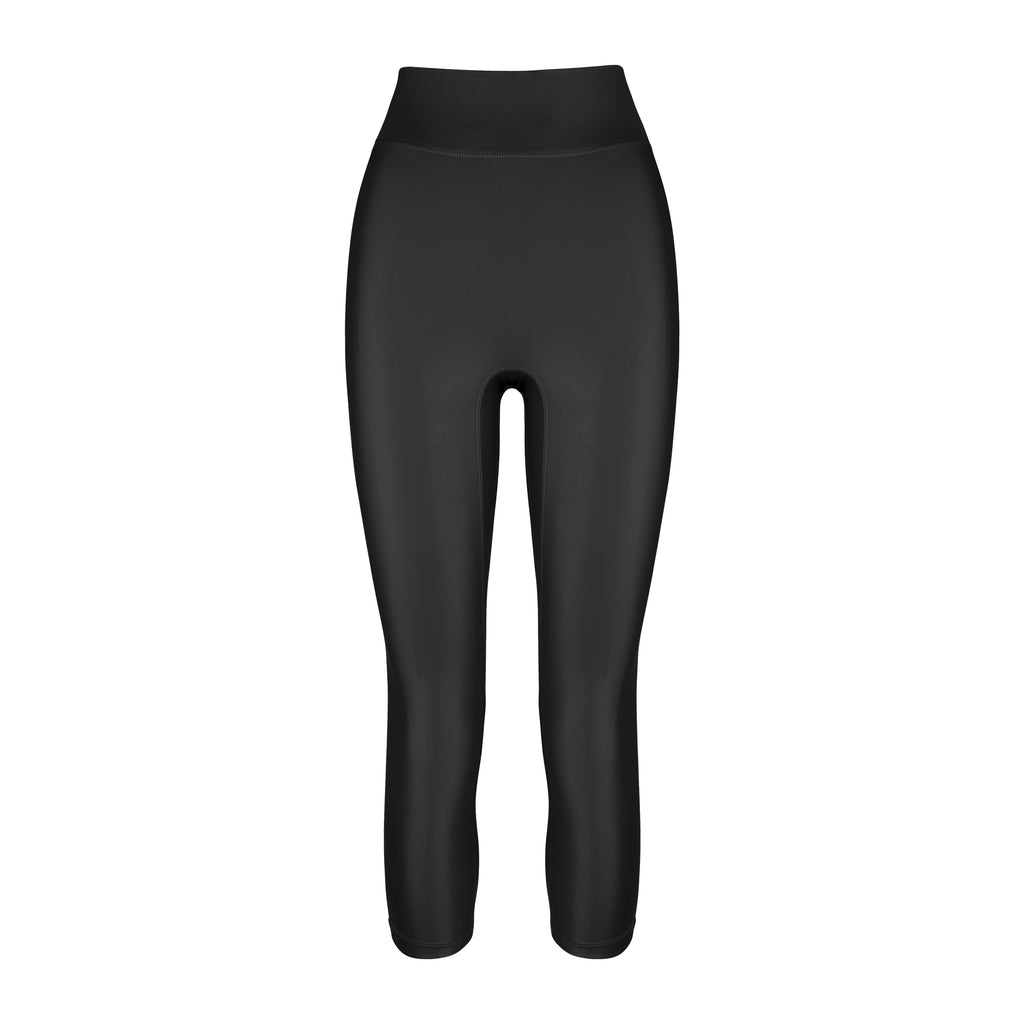 High-waisted black leggings with a compressive waistband for a slimming, luxurious fit. Perfect for high-intensity activities, ghost image front view