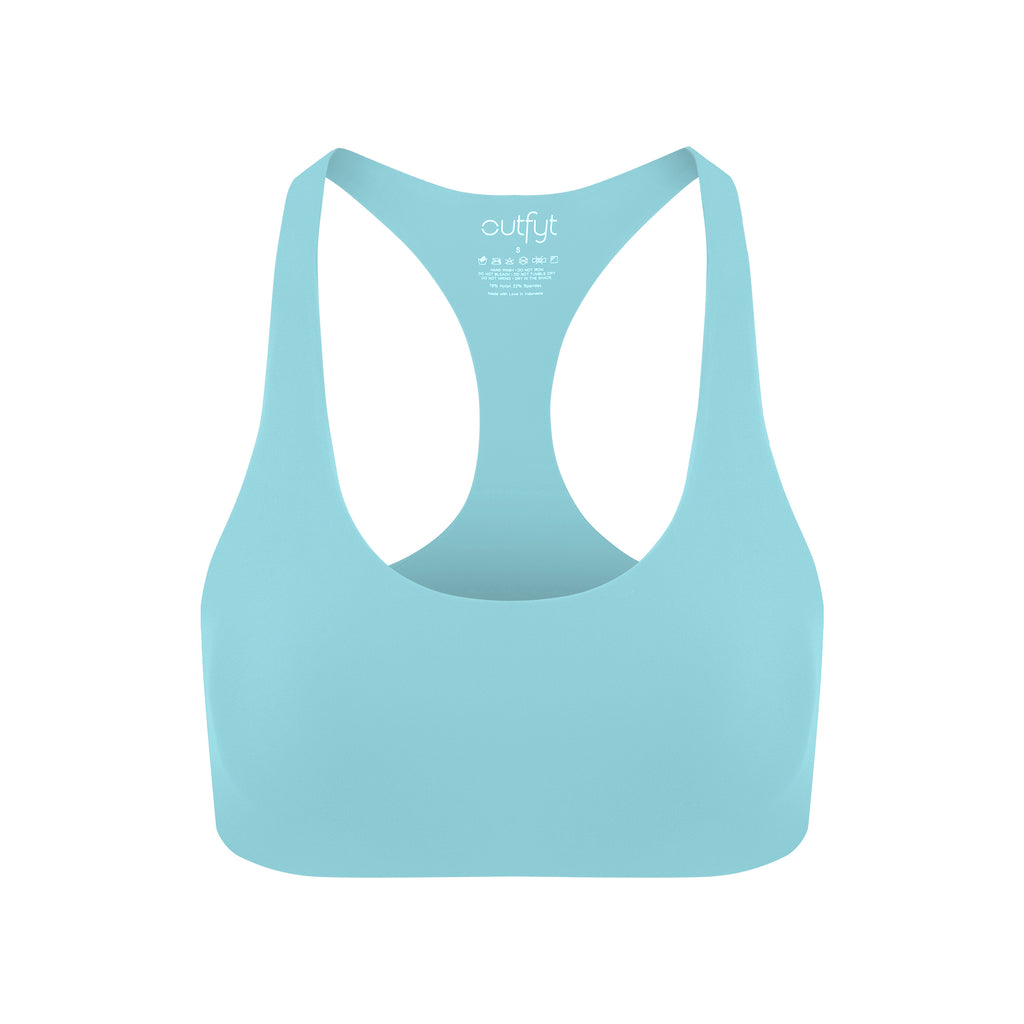Light blue racerback sports bra with medium support, seamless comfort and flattering fit with cute neckline