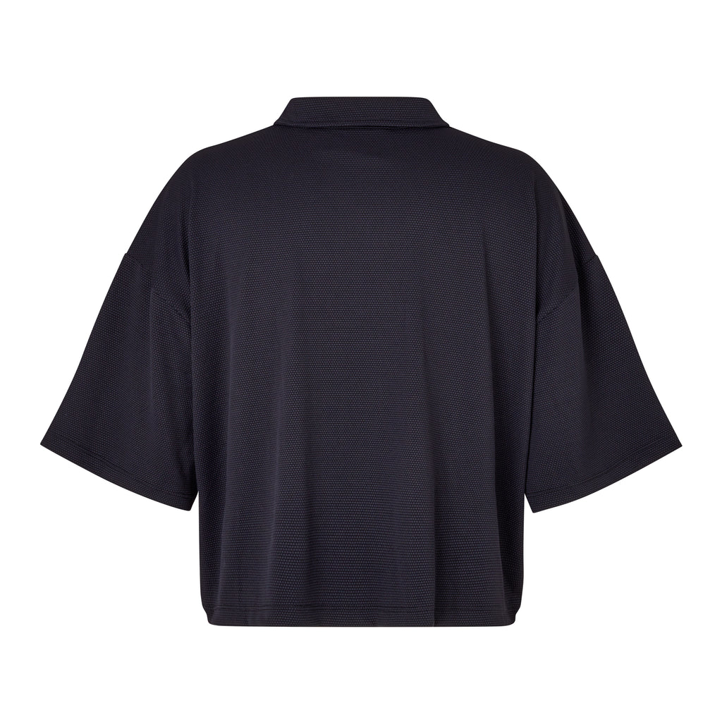 Black Boxy Polo Shirt with lightweight, airy sleeves for free movement, ghost image back view