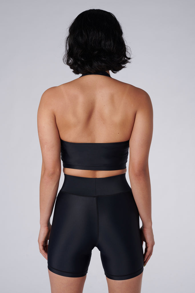 Low-impact black seamless fit with removable padding and in-built sports bra for comfort and support back view