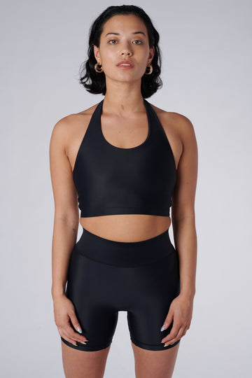 Low-impact black seamless fit with removable padding and in-built sports bra for comfort and support front view