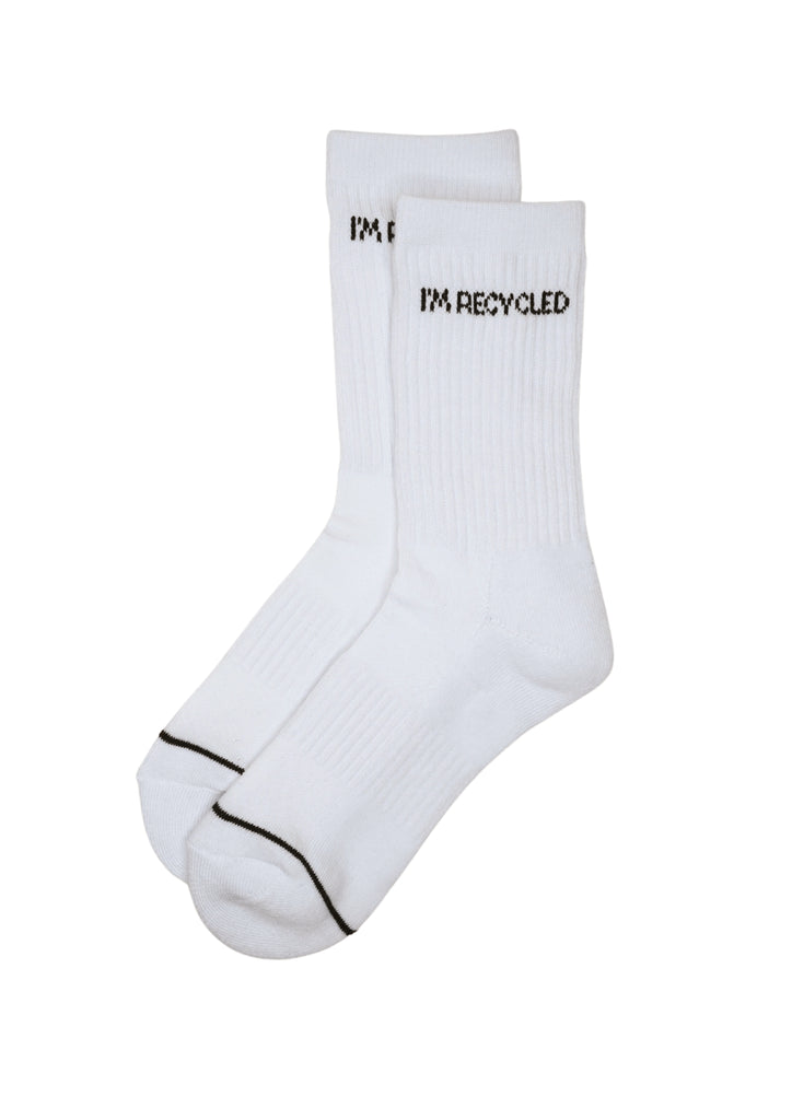 White sweat-wicking, cushioned socks with ribbed arch support, seamless toe, and reinforced heel. 97% recycled polyester.