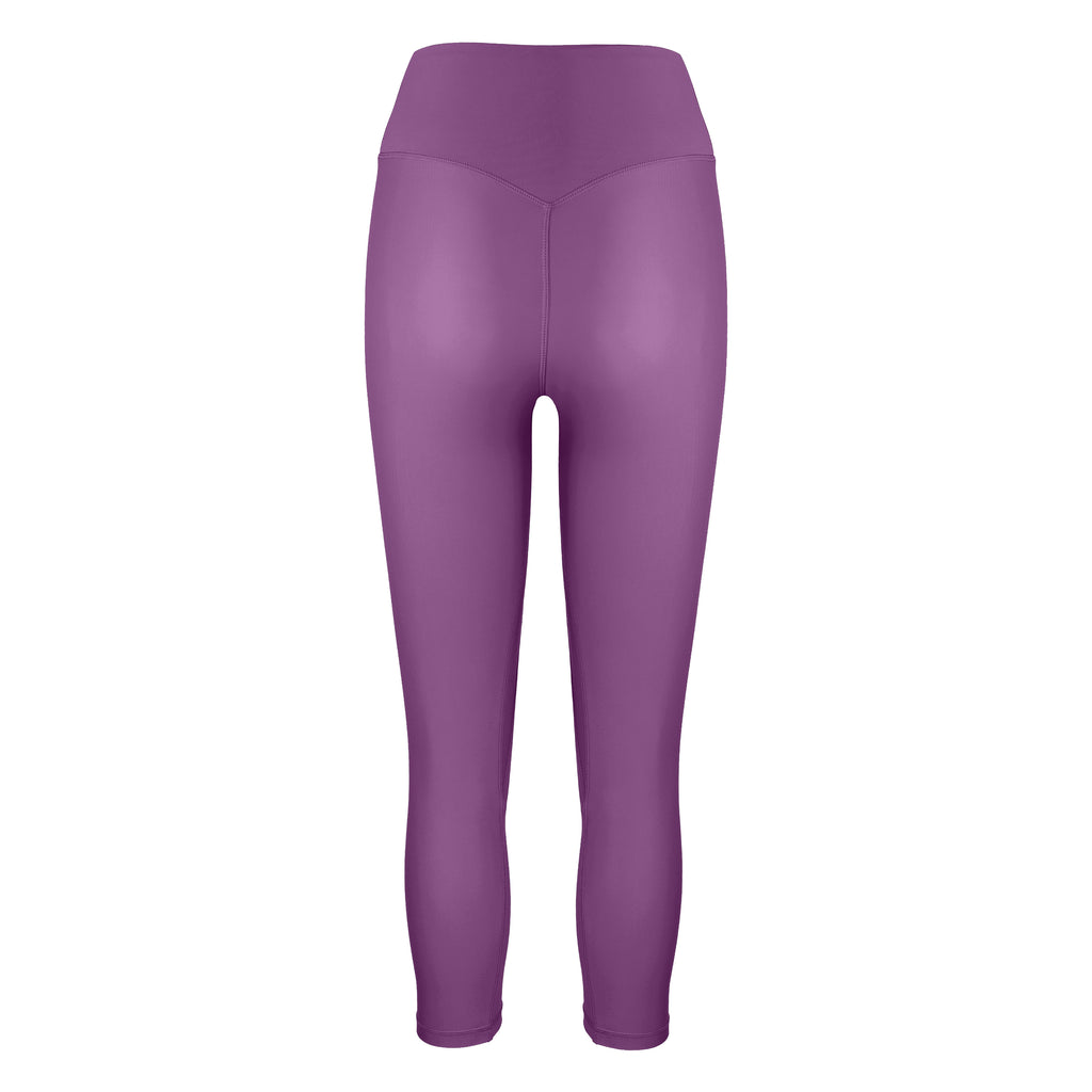 Super soft purple high-waisted 7/8 leggings without a front seam for all-day comfort. Perfect for non abrasive sports and everyday wear, ghost image back view