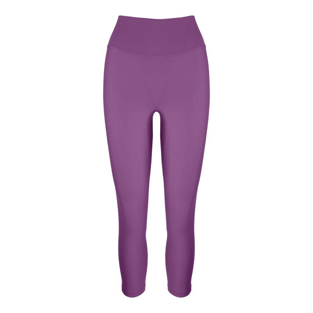 Super soft purple high-waisted 7/8 leggings without a front seam for all-day comfort. Perfect for non abrasive sports and everyday wear, ghost image front view