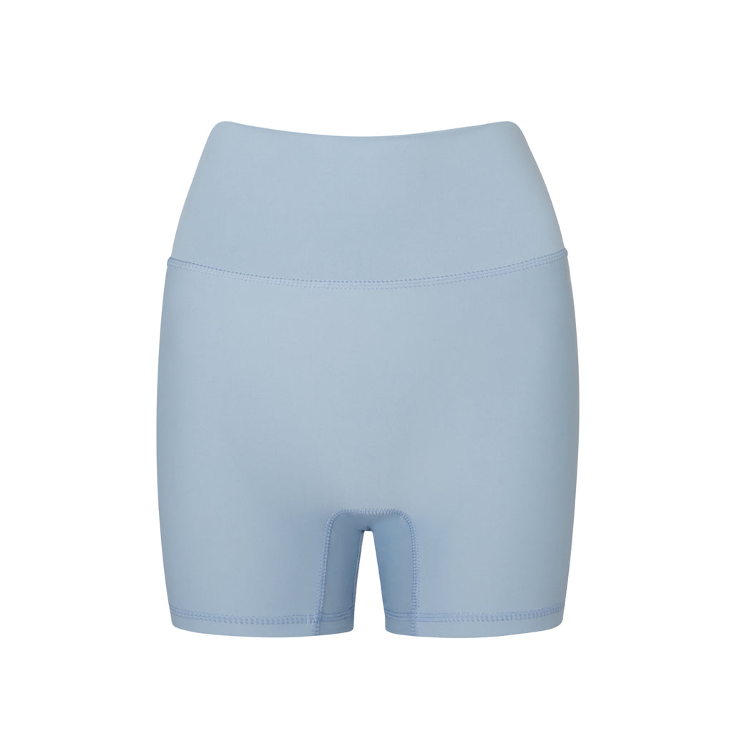 Light blue high-waisted shorts with a double-layered waistband that lies flat. No front seam for ultimate comfort and no camel toe, ghost image front view