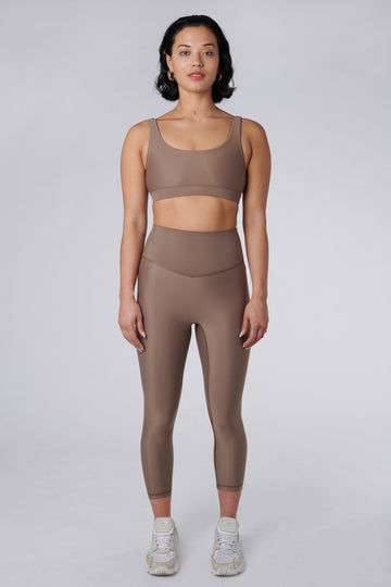 Versatile sand  colour 7/8 compressive leggings that fit like a glove and stay put during workouts. Squat proof and no front seam for ultimate comfort, 