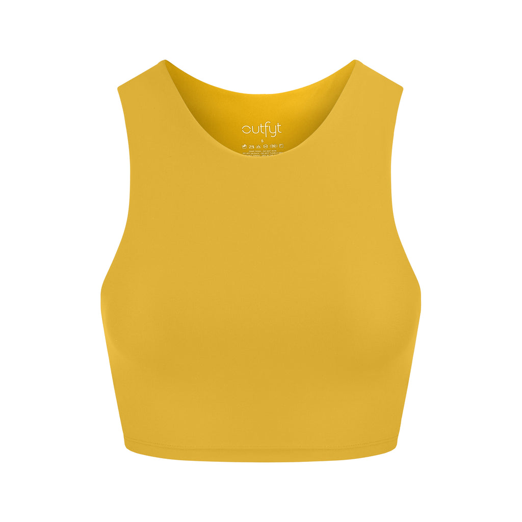 Award-winning yellow crop top with a flattering cut, high neckline for coverage, and in-built sports bra. Medium impact support, perfect for day wear, ghost image front view