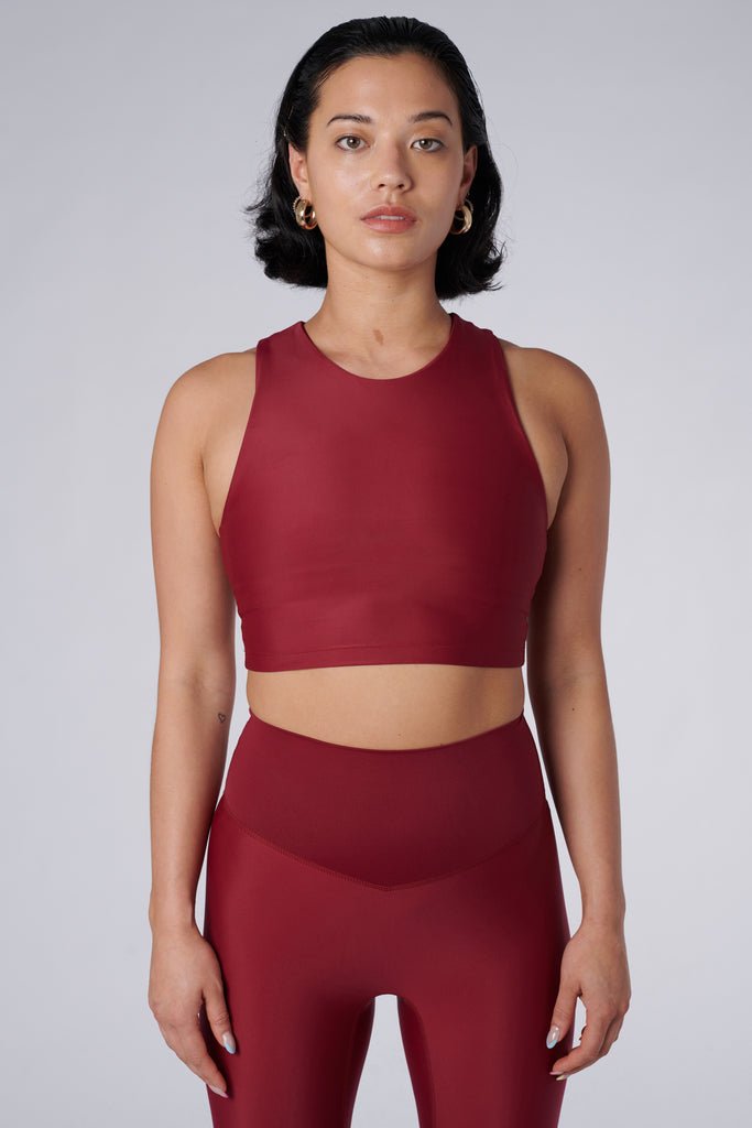 Award-winning wine red crop top with a flattering cut, high neckline for coverage, and in-built sports bra. Medium impact support, perfect for day wear