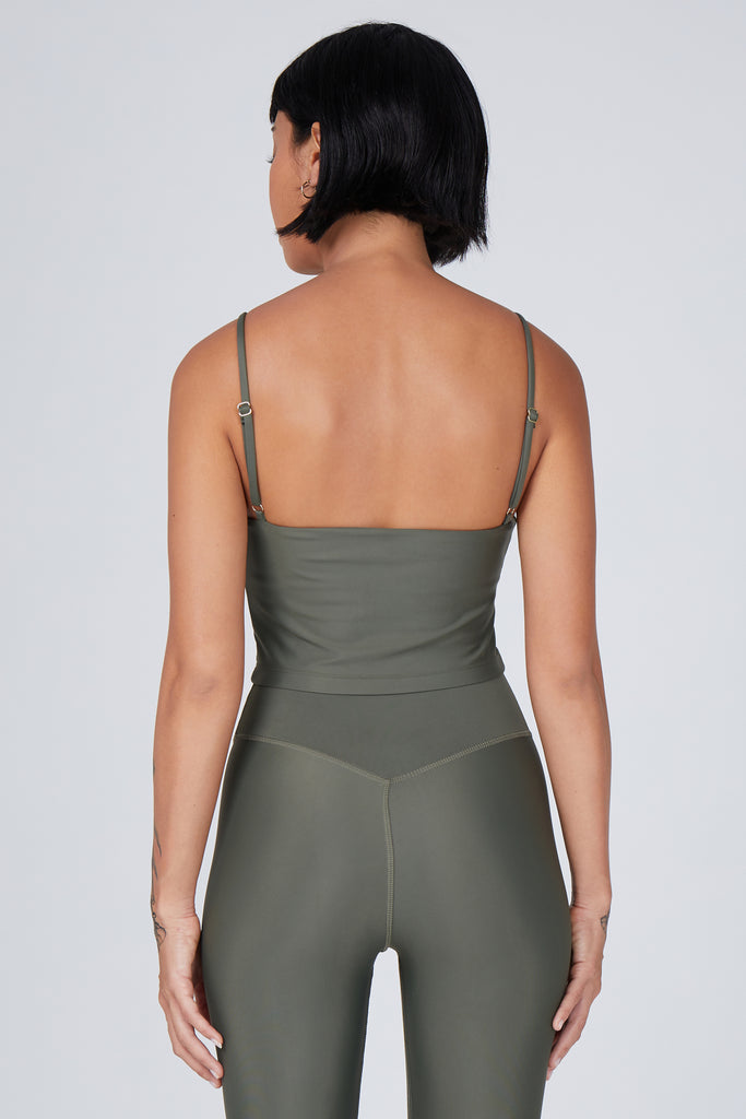 Olive green crop top with inbuilt bra for low-impact activities, seamless fit, removable padding, and adjustable straps. Comfortable for work or on the go, back view